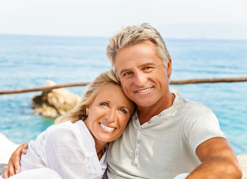 amg_financial_retired_couple-on-beach